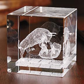 Crystal bull and bear paperweight